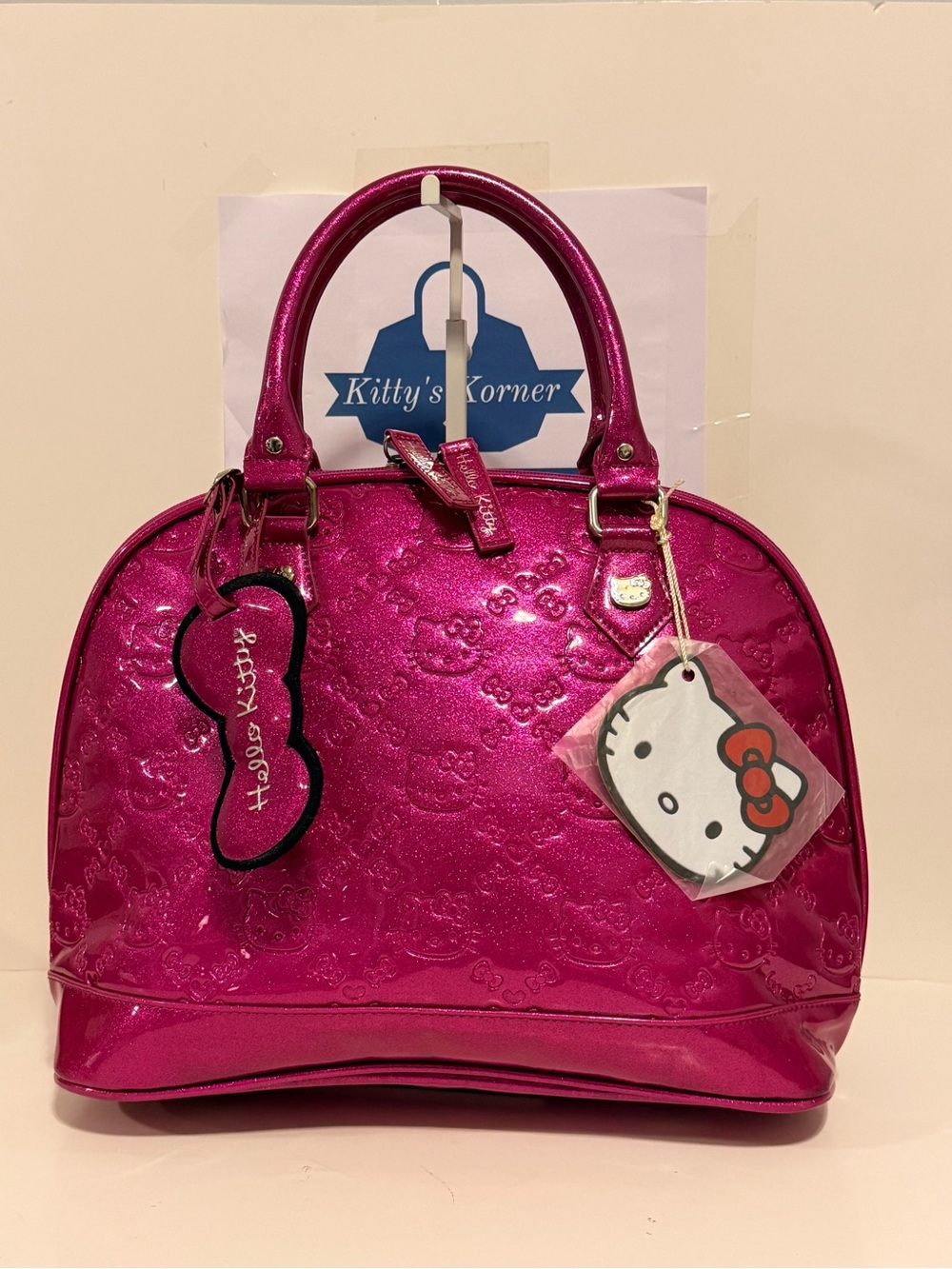 NWT Loungefly Sanrio Hello Kitty Metallic Hot Pink Embossed Bowler Bag.